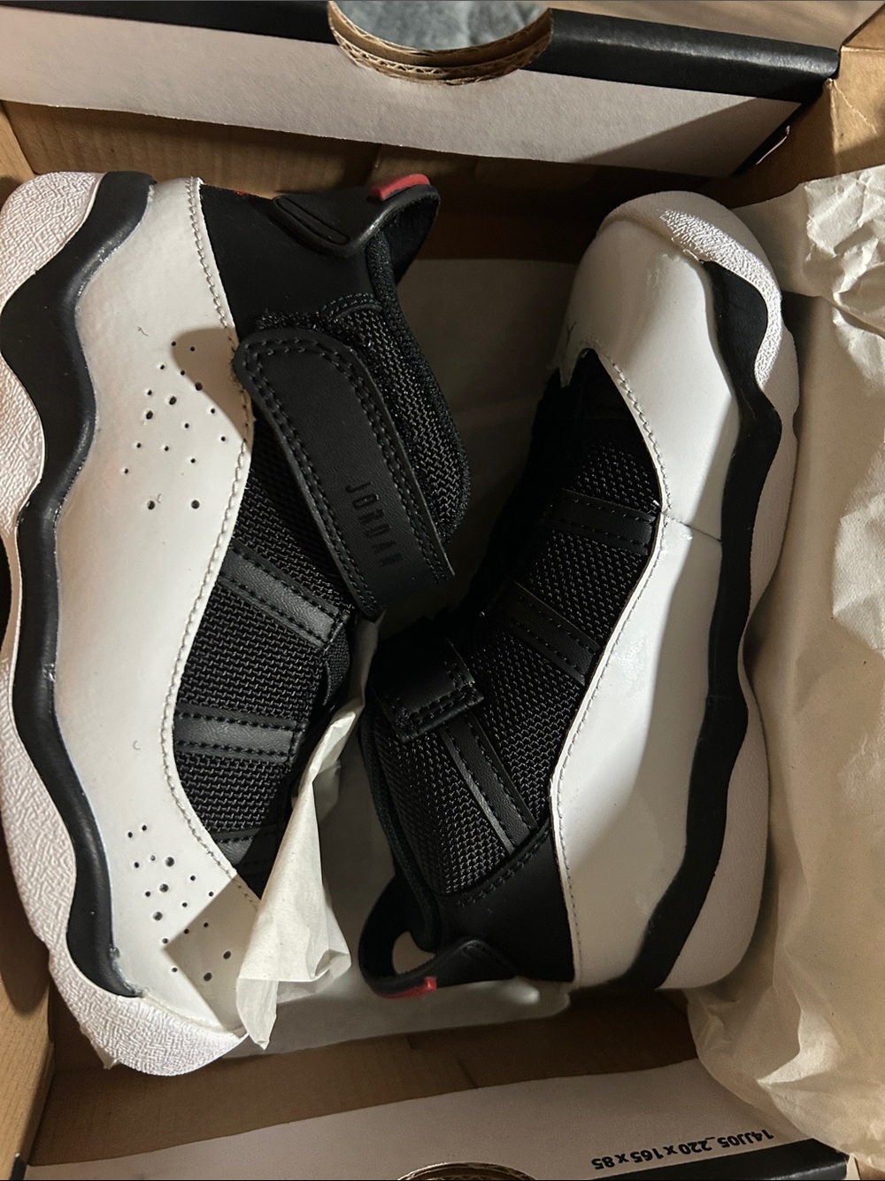 Jordan Kids Black and White Low-Top Sneakers with Red Accent